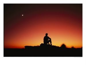 131854silhouette-of-sitting-man-looking-at-the-sunset-and-the-moon-posters